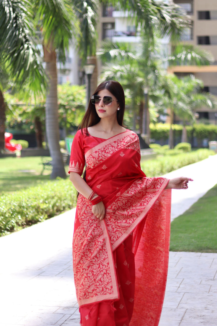 Elegant handloom raw silk saree with woven pallu and intricate butties