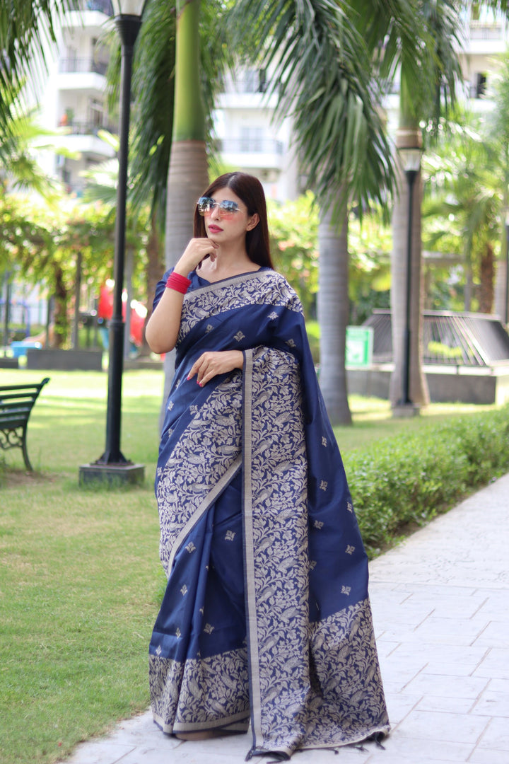 Luxurious handloom raw silk saree with woven pallu and intricate butties for weddings