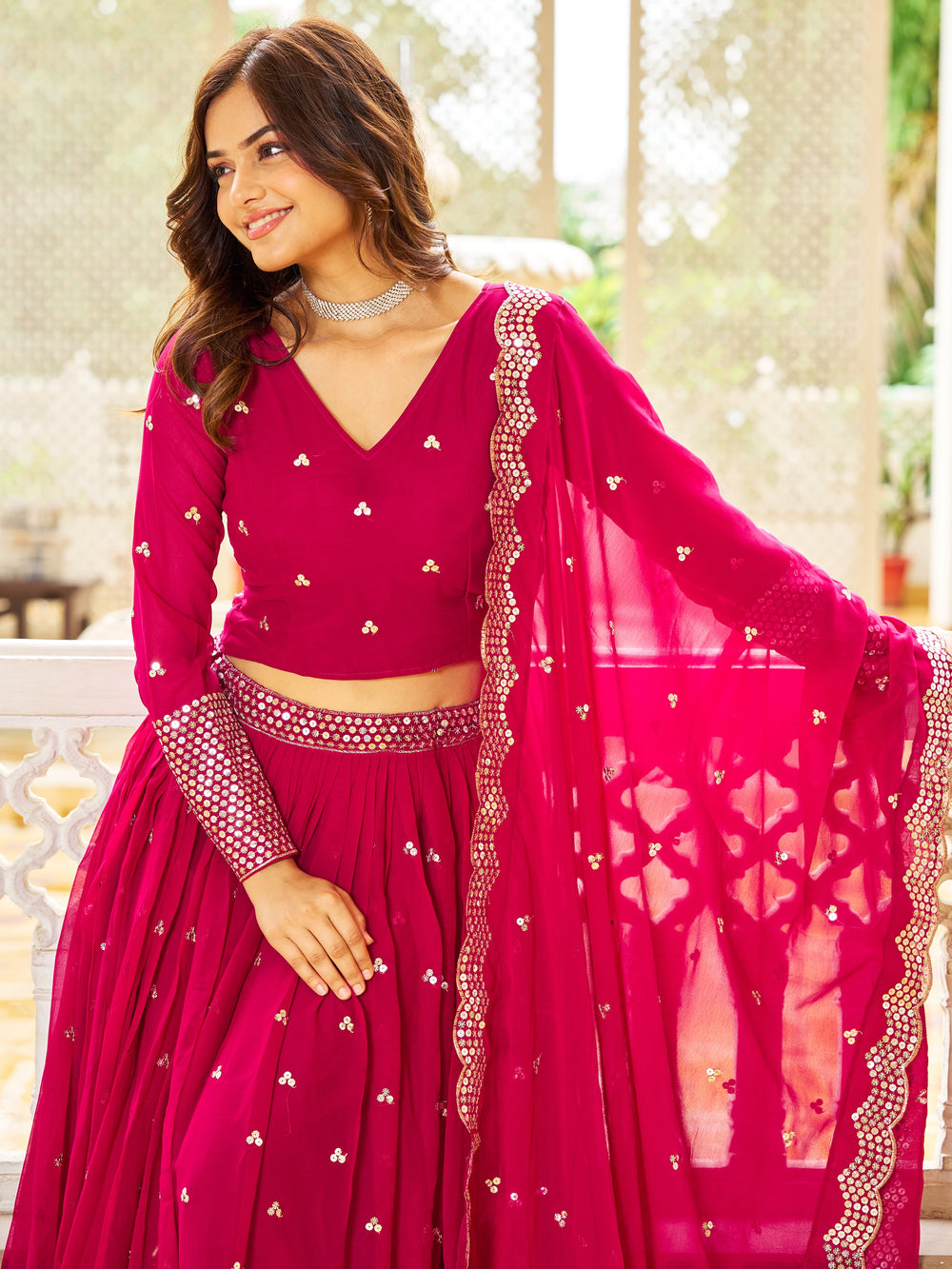 AlluringÃƒâ€šÃ‚Â Pink Sequins Georgette Engagement Wear Lehenga Choli