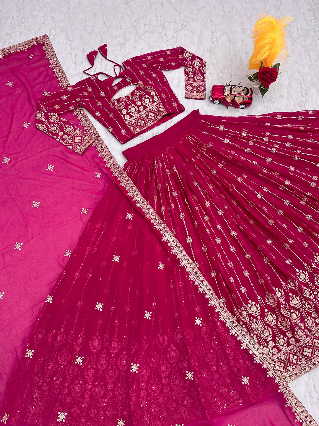 LovelyÃ‚Â Rani Pink Embroidered Georgette Engagement WearÃ‚Â Lehenga Choli