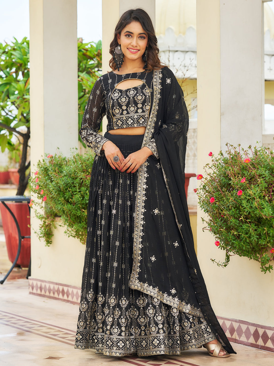 GlamorousÃ‚Â Black Embroidered Georgette Reception Wear Lehenga Choli