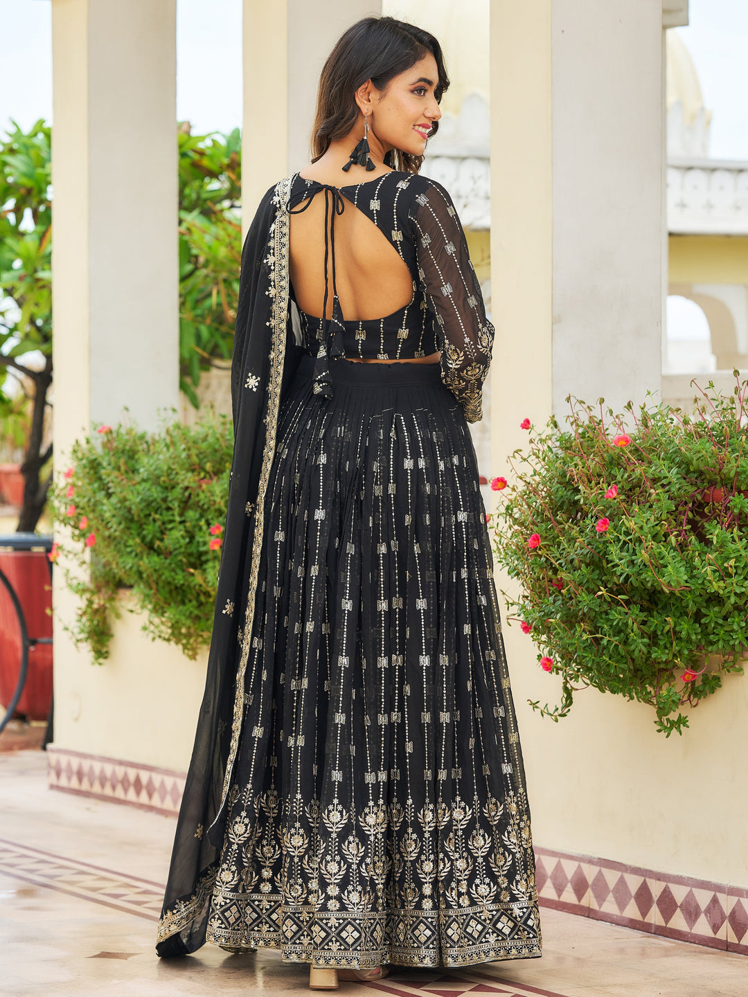 GlamorousÃ‚Â Black Embroidered Georgette Reception Wear Lehenga Choli