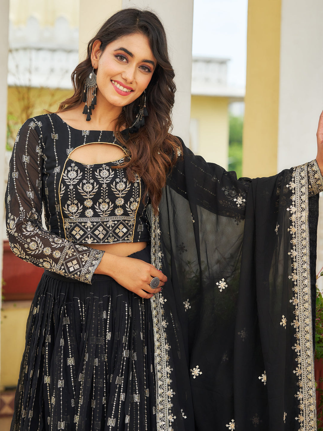 GlamorousÃ‚Â Black Embroidered Georgette Reception Wear Lehenga Choli