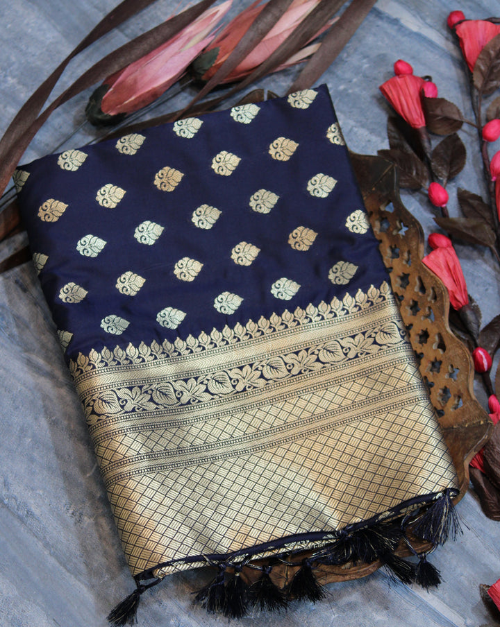 Banarasi Katan silk saree featuring stunning zari weaves and a matching blouse piece