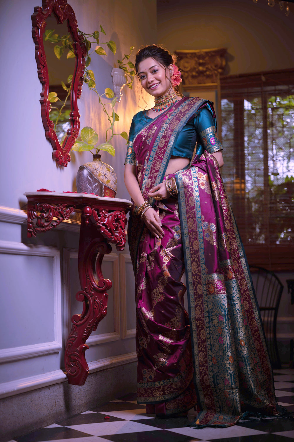 Soft Banarasi saree featuring intricate Meena weaving patterns and tassels