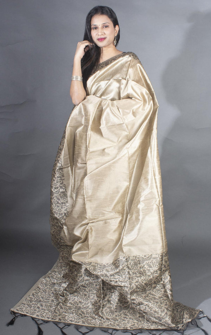 Classic cream raw silk saree with a rich pallu, ideal for weddings and cultural events.