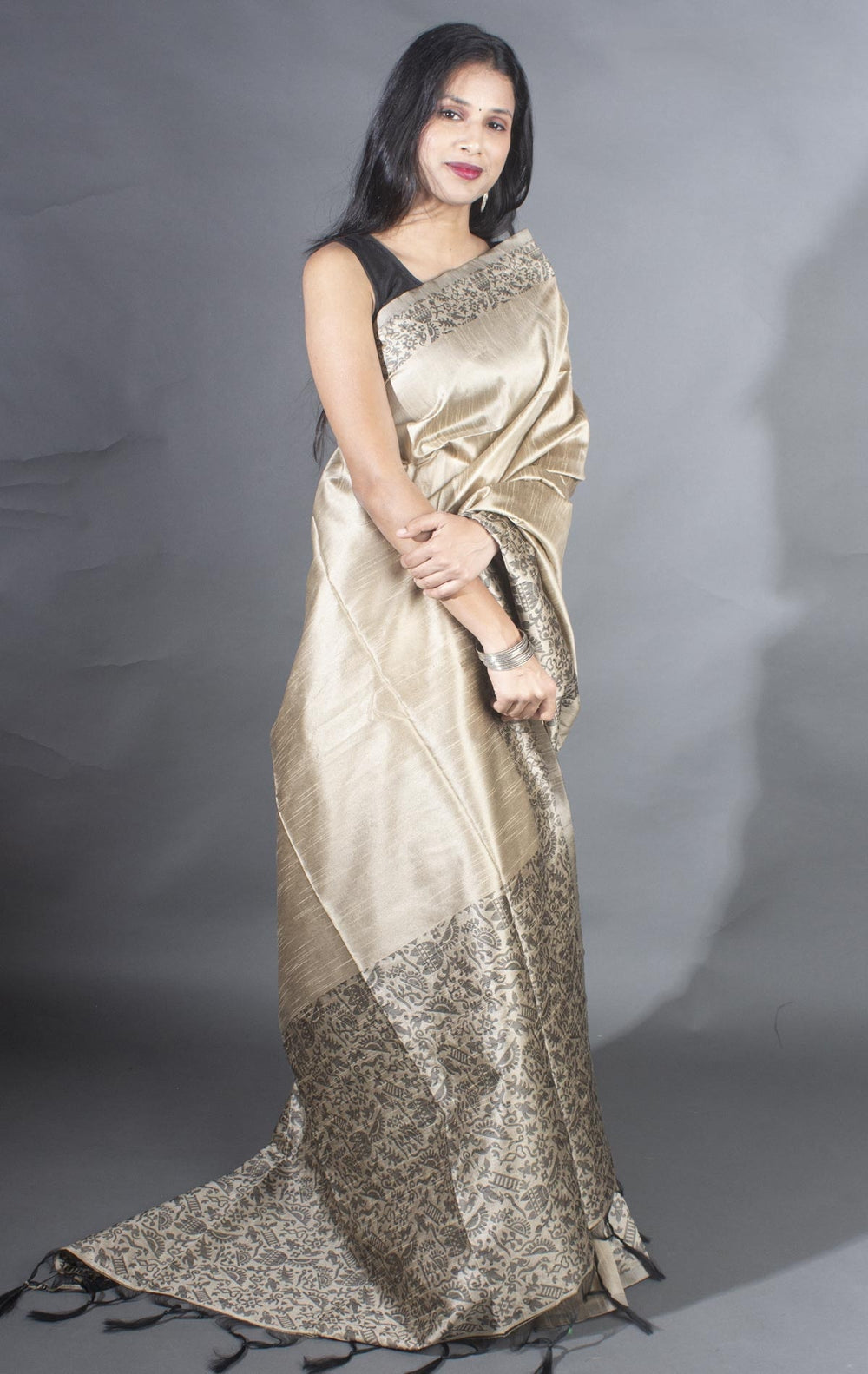 Sophisticated cream raw silk saree with a rich pallu, ideal for festive and formal occasions.