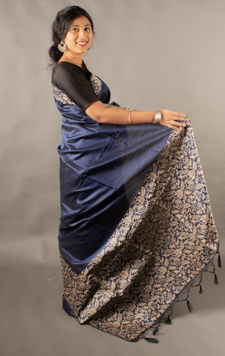 Elegant navy Banglori raw silk saree with a rich pallu, ideal for festive occasions.