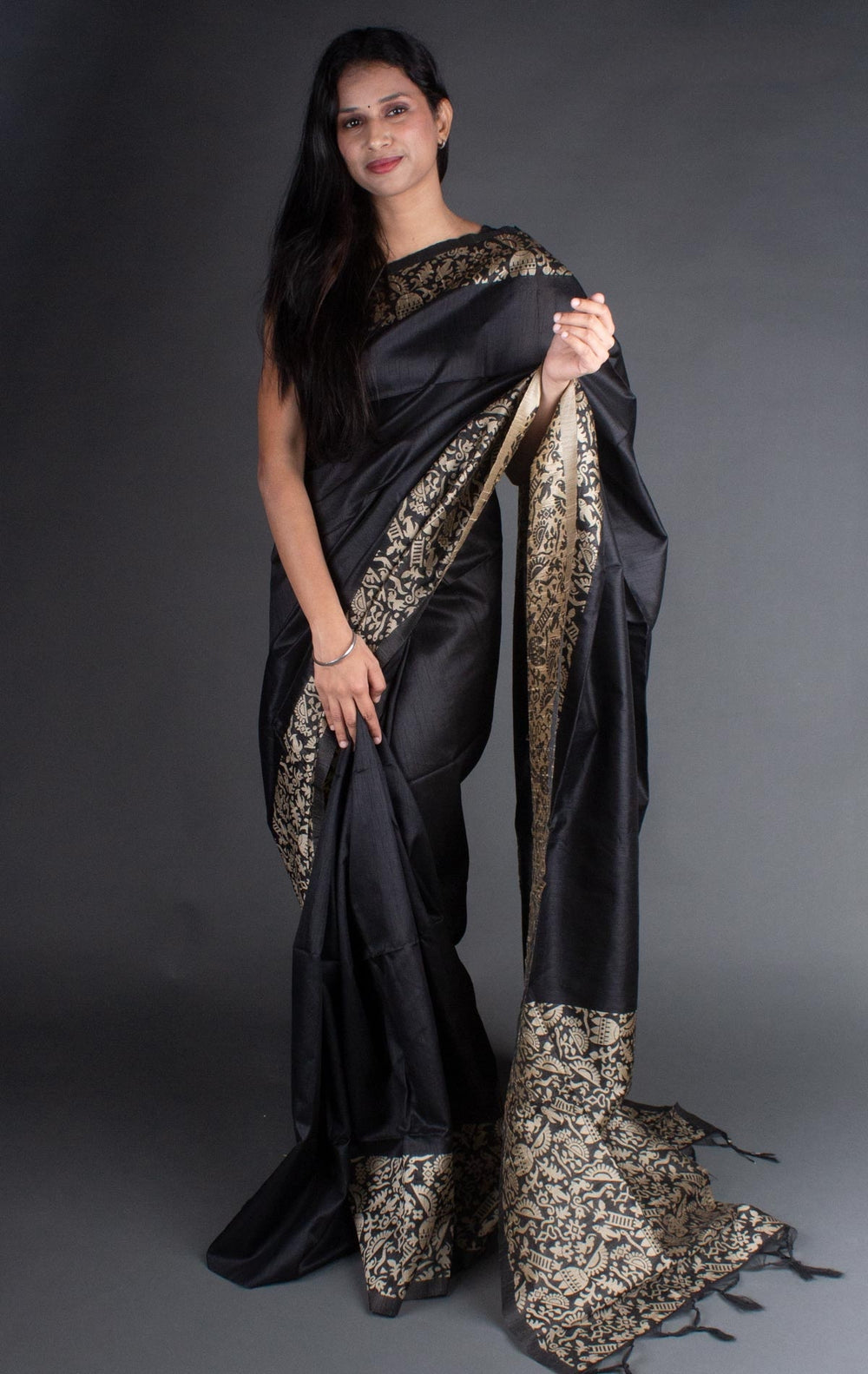 Elegant black Banglori handloom raw silk saree with a rich pallu, perfect for festive occasions.