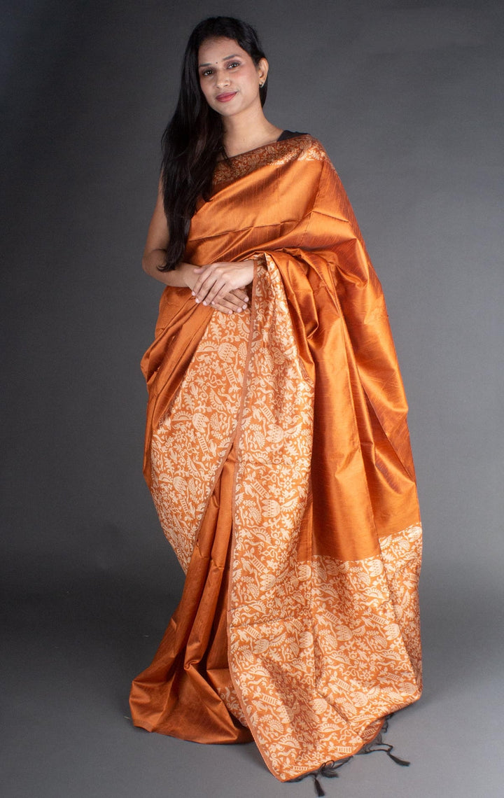 Sophisticated orange Banglori handloom raw silk saree with a rich pallu, ideal for grand events.