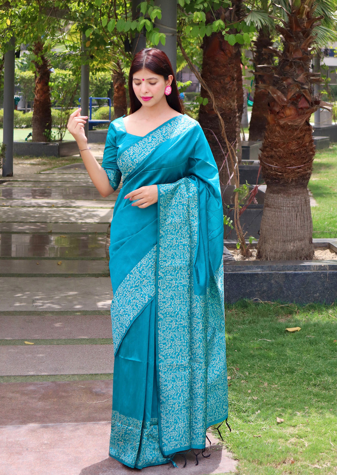 Celebrate in style with this {color} traditional Indian sari made of Banglori raw silk.