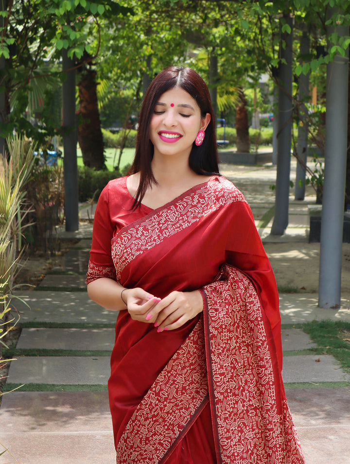 Show off your ethnic fashion with this {color} designer saree made of handloom raw silk.