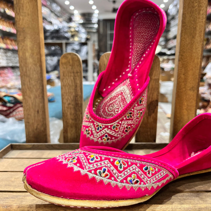 Gulnaar Handcrafted Juttis | Vibrant Fuchsia Pink with Multicolored Zari Detailing