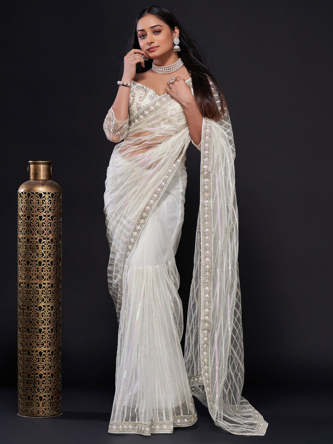 White silk saree crafted for elegance and style.