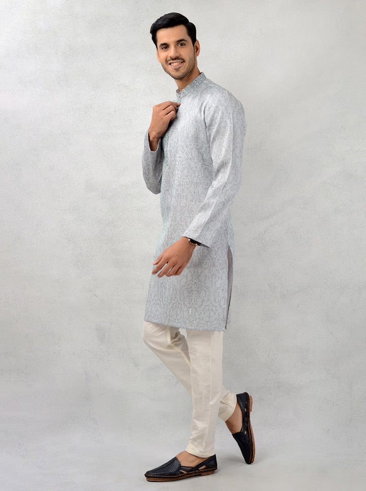 Celebrate in style with this luxurious grey silk blend kurta set, ideal for enhancing your festive wardrobe.