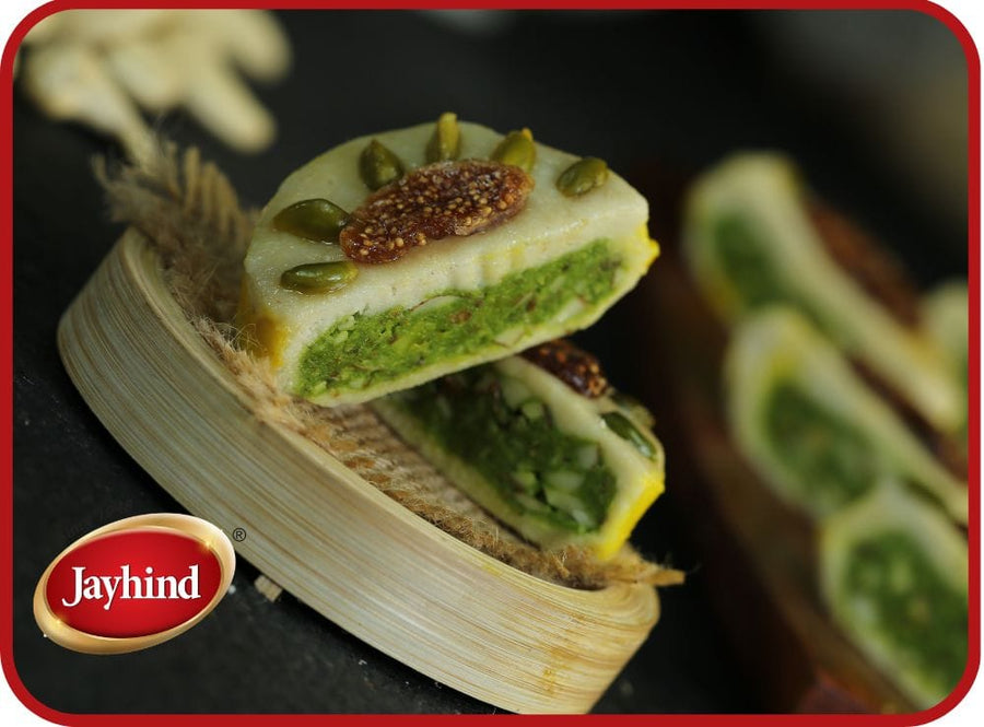 Indrani sweet with crispy outer layer and rich khoya filling, flavored with aromatic spices – a delightful treat.