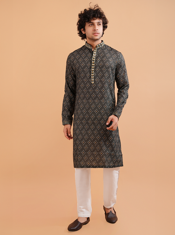 Elegant dark green silk blend kurta pajama set for men, designed for weddings and poojas.