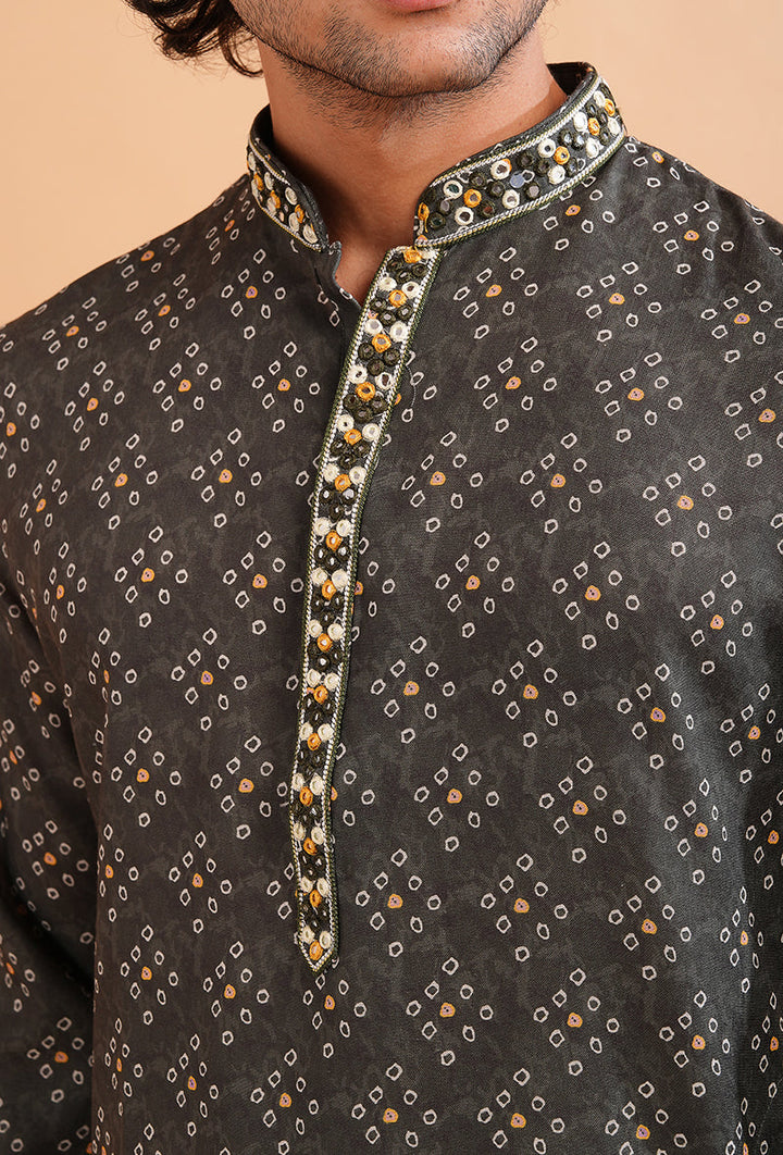 Luxurious green embroidered kurta pajama for men, perfect for events.