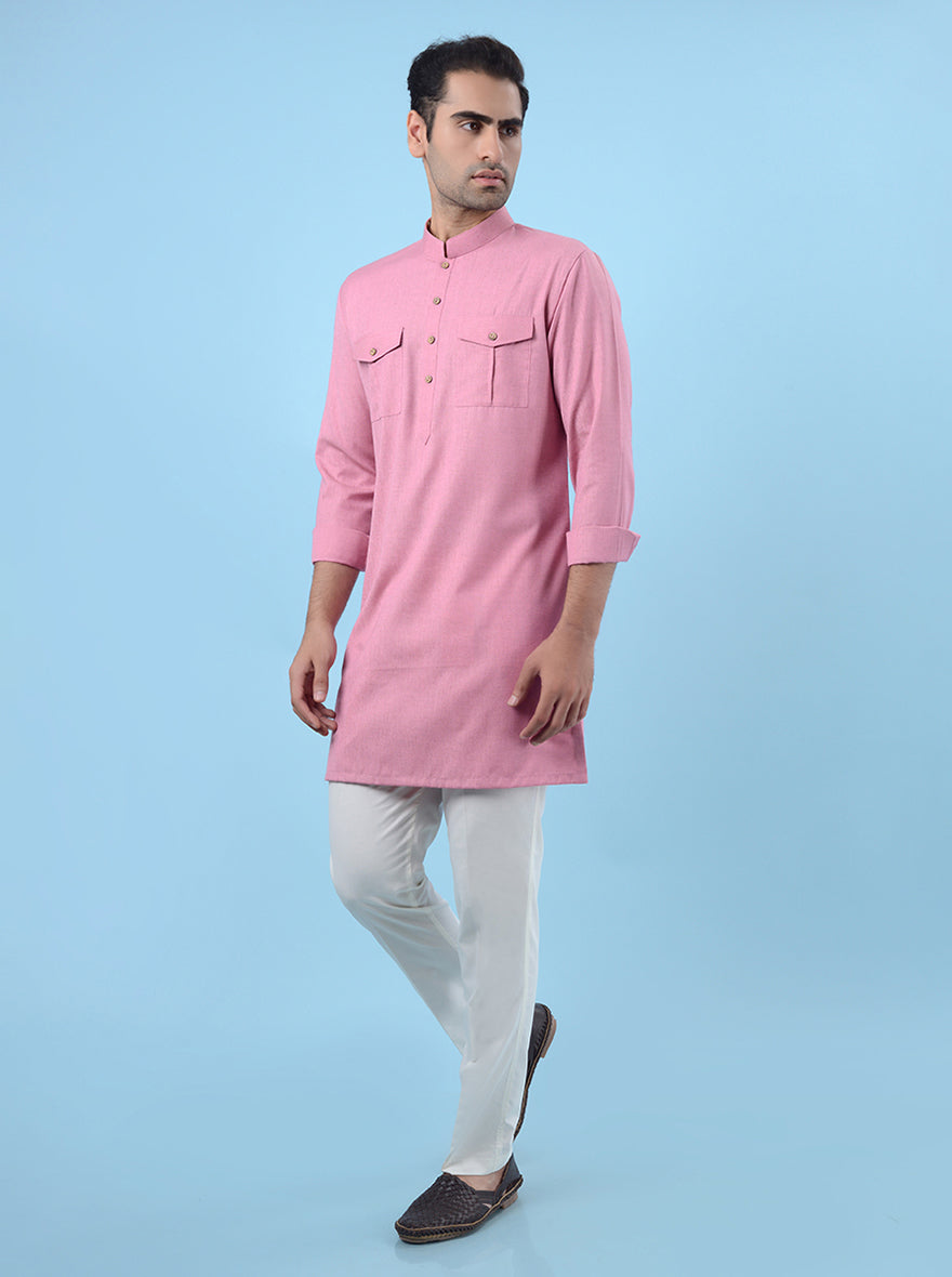 Stylish pink silk blend kurta pajama set for men, offering a regular fit for ethnic wear on special occasions.