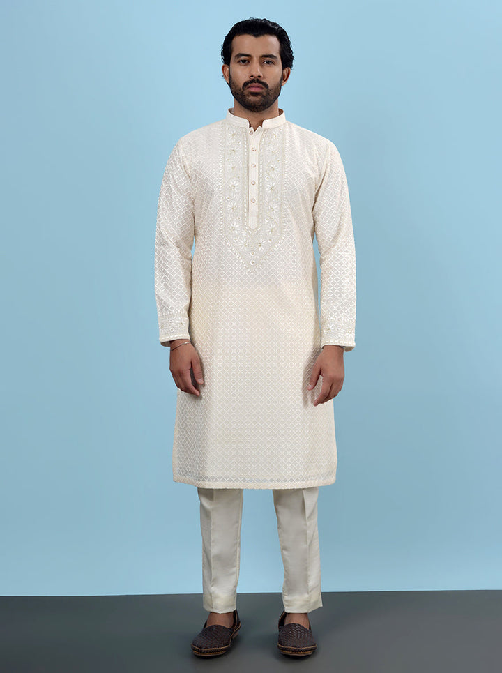 Elegant cream kurta pajama for men, silk blend and embroidered, ideal for traditional USA ceremonies."