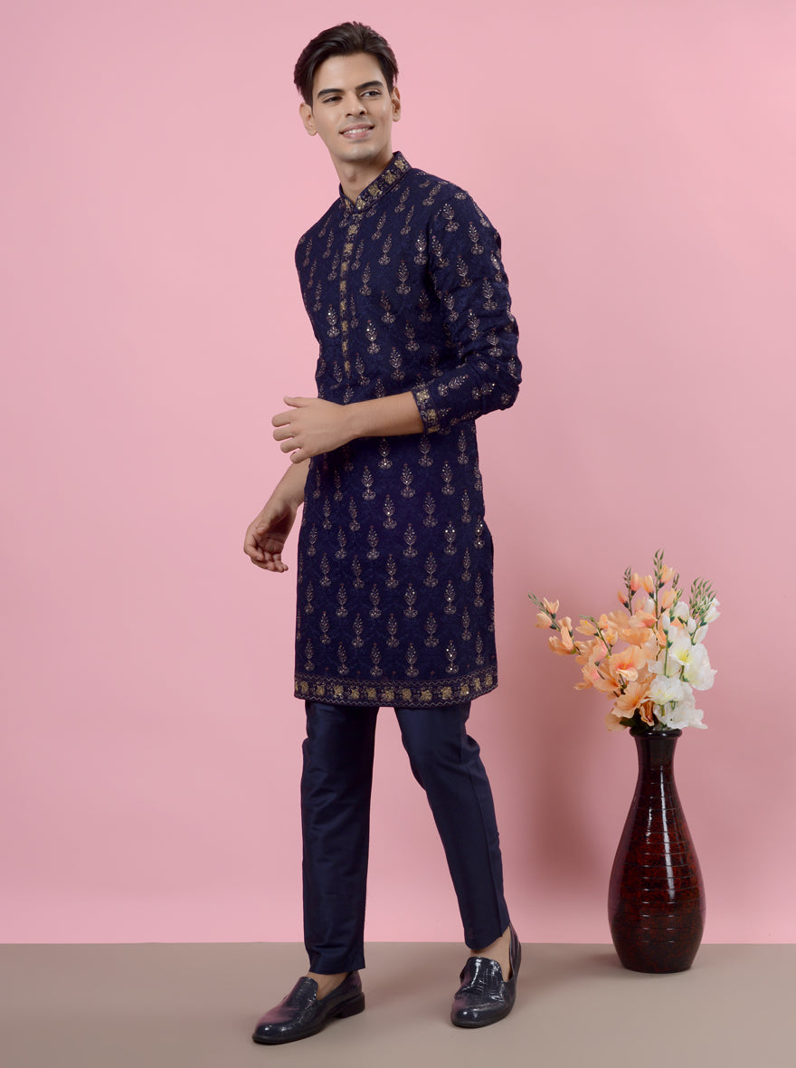 Stylish navy blue kurta pajama crafted from georgette, ensuring you shine at festive gatherings.