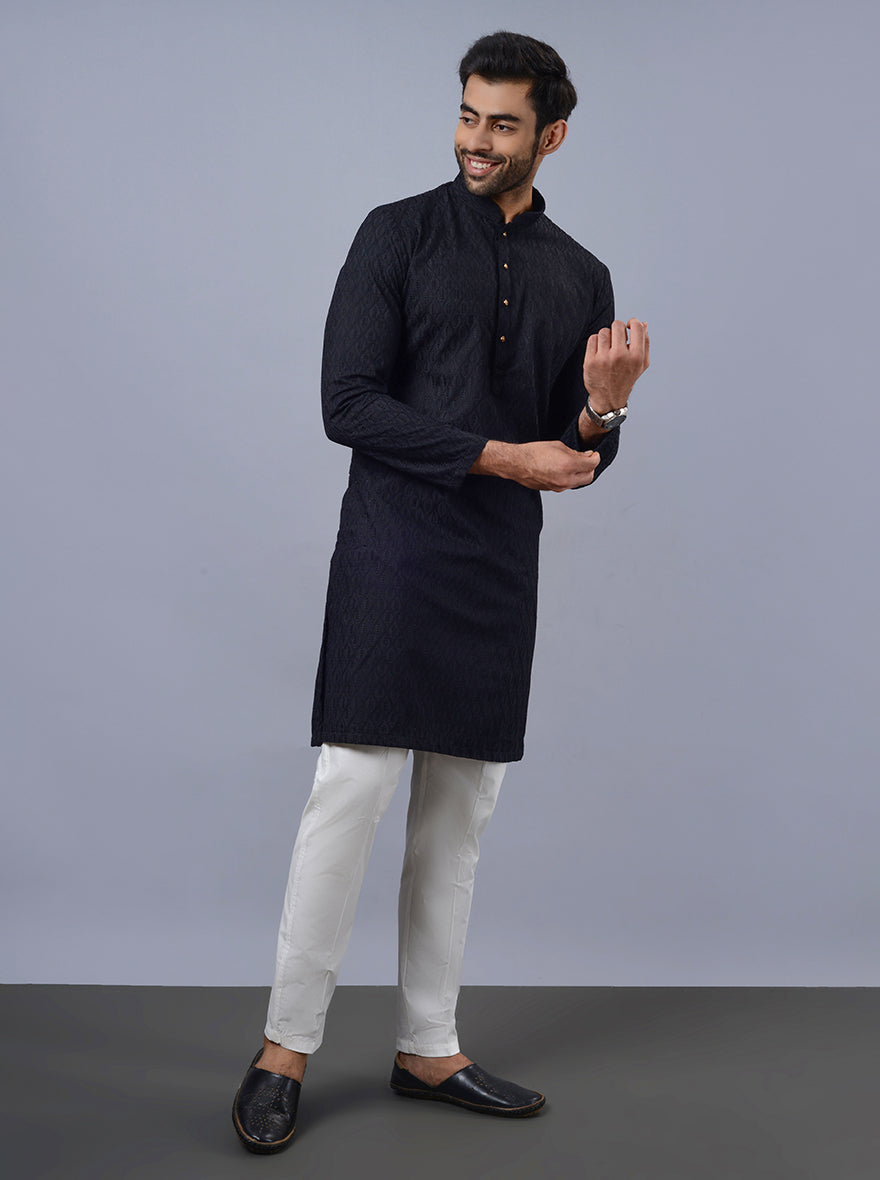 USA men’s black kurta set with white pants, perfect for celebrations.