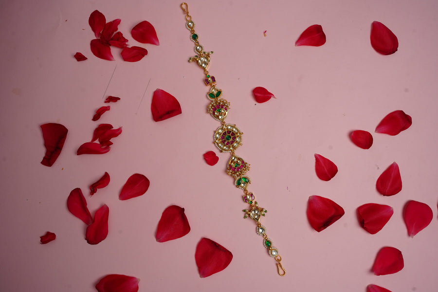 Beautiful floral headpiece crafted with Sheeshphool, ideal for enhancing bridal looks.