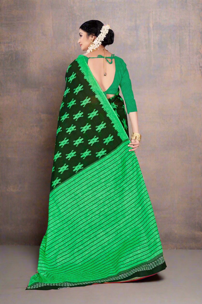 Elegant dark green batik saree, ideal for cultural events and traditional Indian weddings.