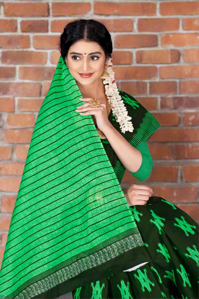 Beautiful dark green batik print saree, perfect for Indian weddings and festive celebrations.