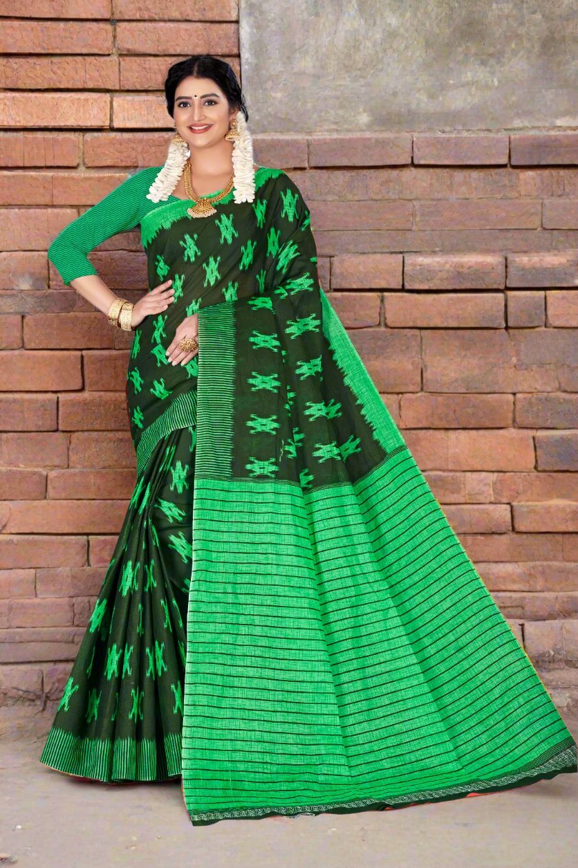 Dark green batik cotton saree with intricate designs, perfect for festive occasions and Indian weddings.