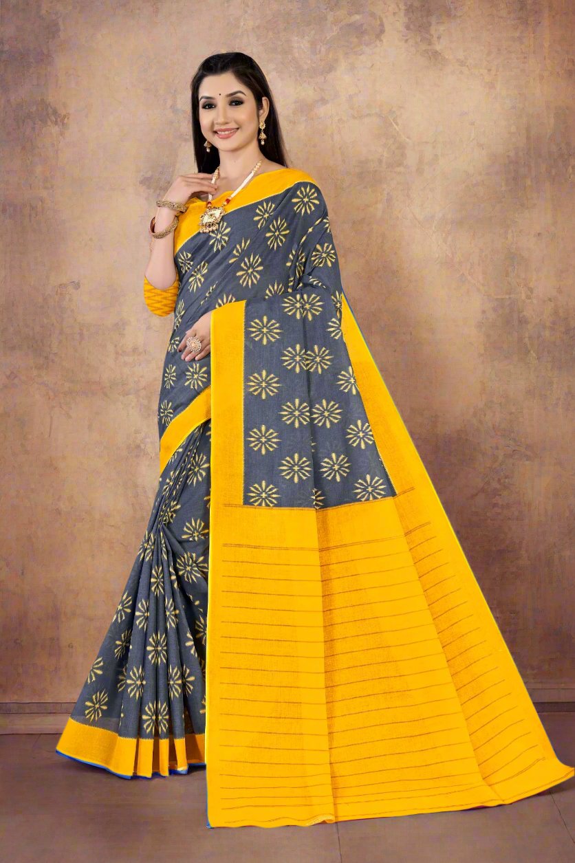 Designer golden and gray batik print cotton saree, perfect for elegant Indian celebrations.