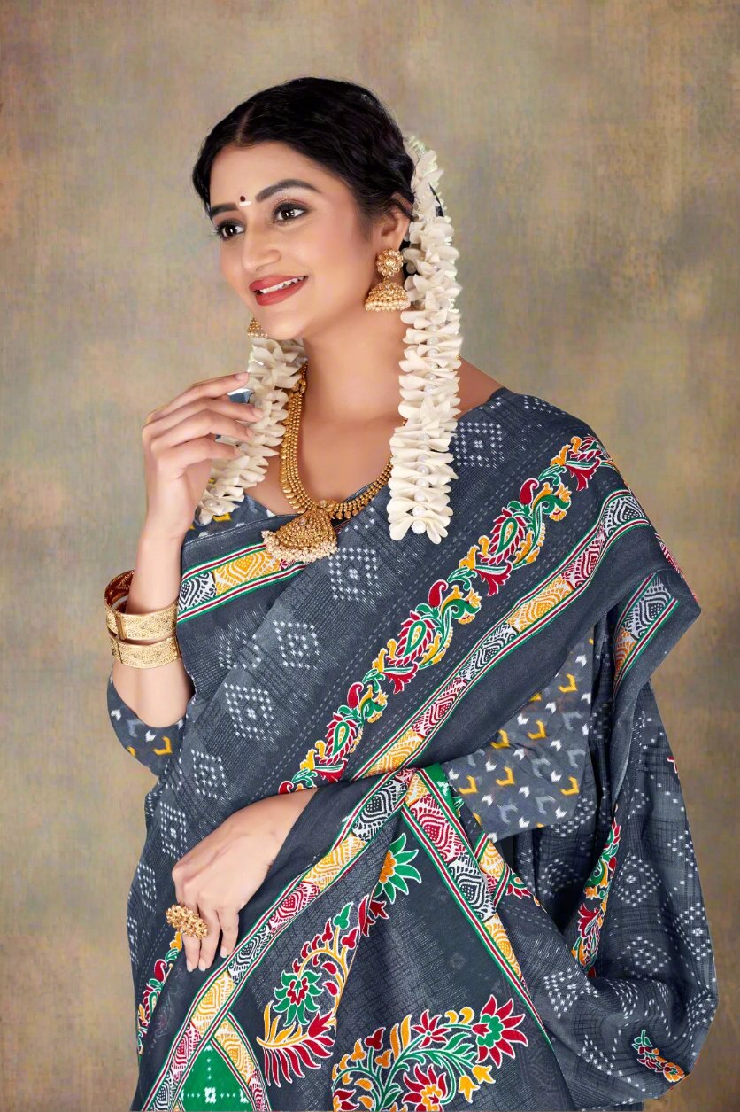 Beautiful grey saree with batik patterns, perfect for Indian weddings and festive events.