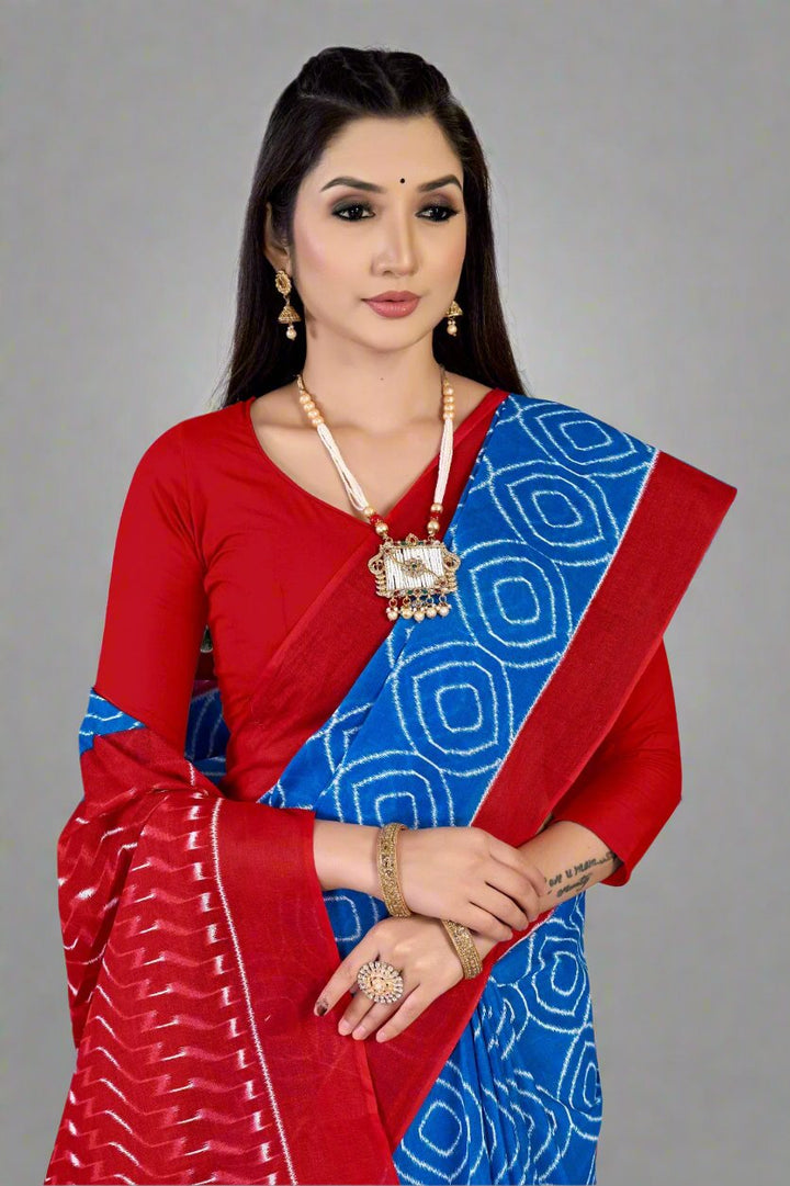 Beautiful blue and red saree, perfect for Indian weddings and celebrations.