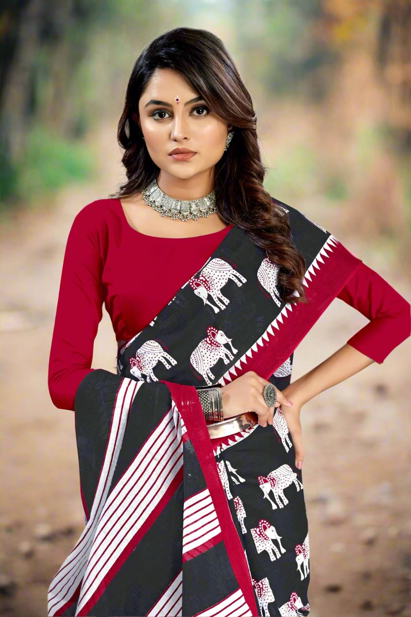 Timeless black and maroon cotton saree with batik art, ideal for Indian weddings.