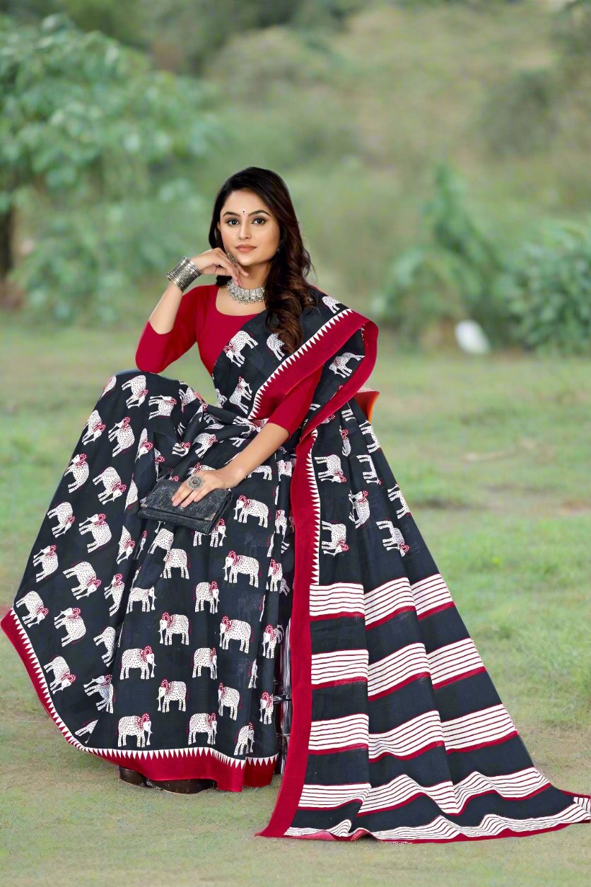 Classic black and maroon batik print saree, a sophisticated choice for festive occasions.