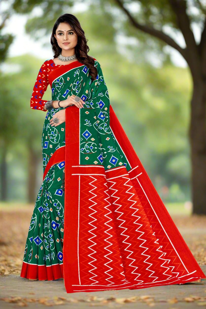 Green and red batik cotton saree, ideal for elegant Indian events and traditional wear.