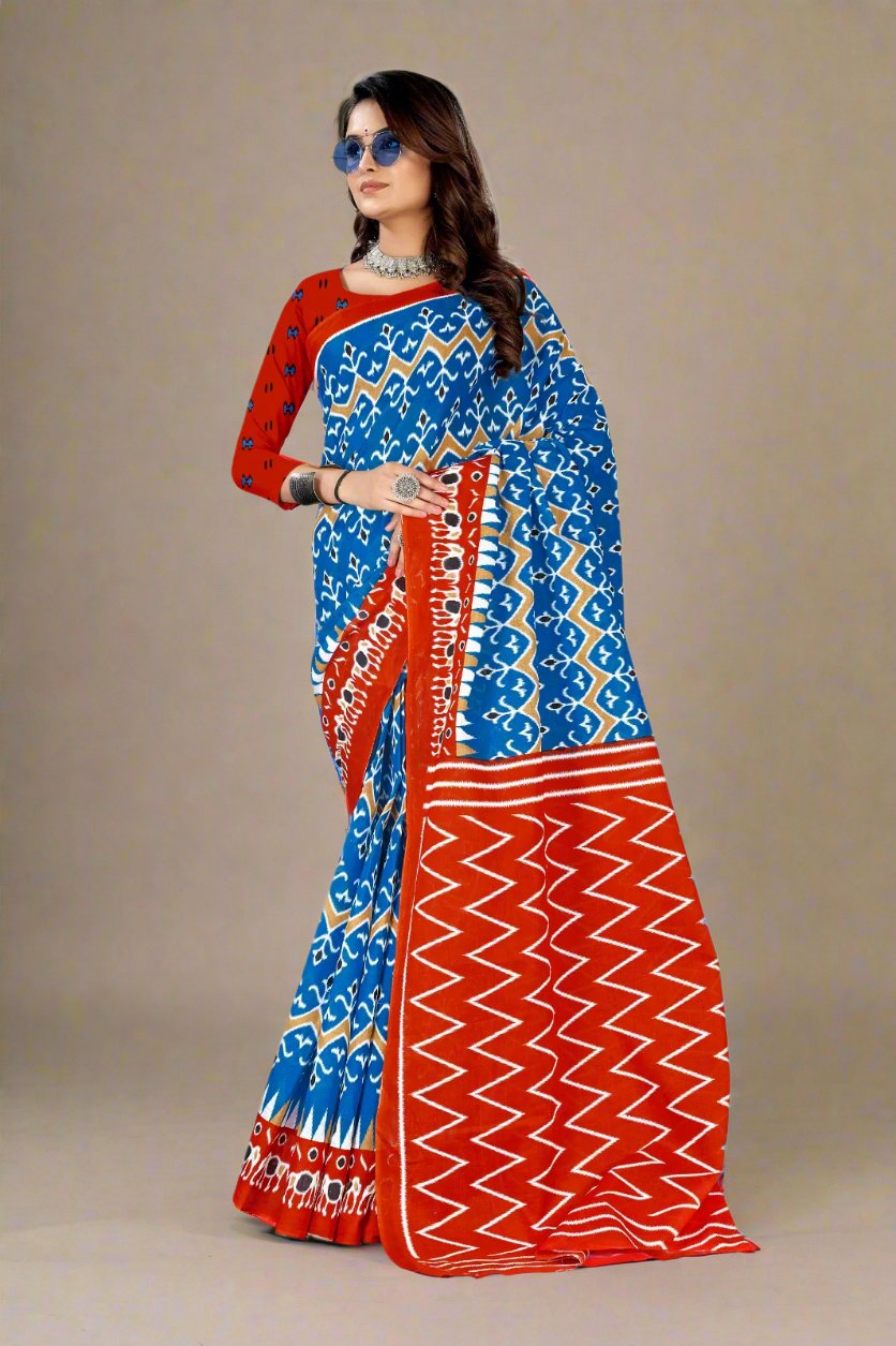 Blue and orange batik saree, a perfect choice for traditional celebrations and weddings.