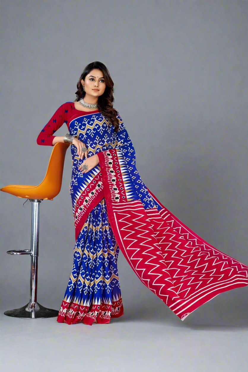 Designer blue and burgundy batik saree, perfect for traditional celebrations and Indian weddings.