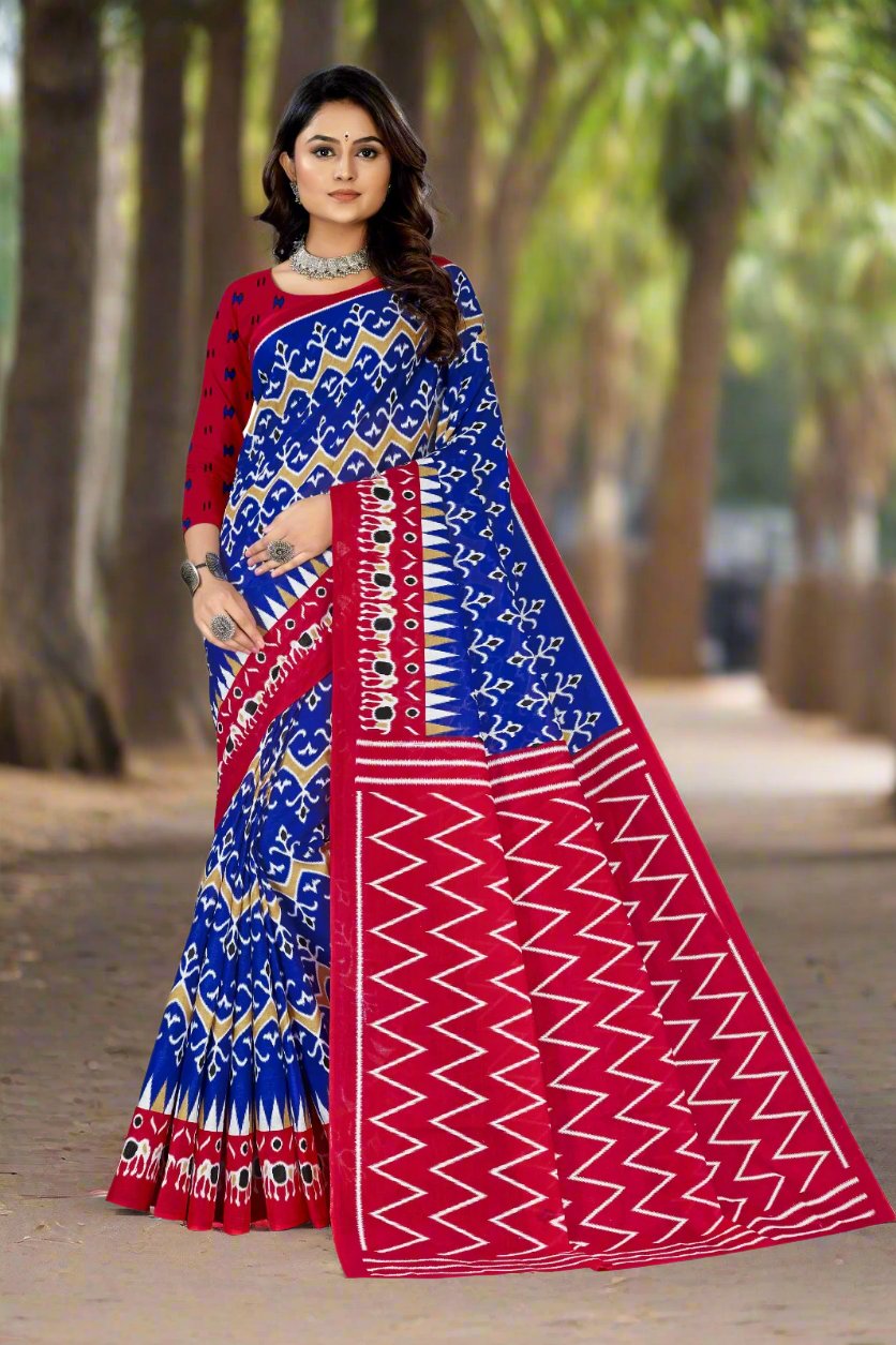 Blue and burgundy batik cotton saree, a designer piece perfect for festive occasions and cultural events.