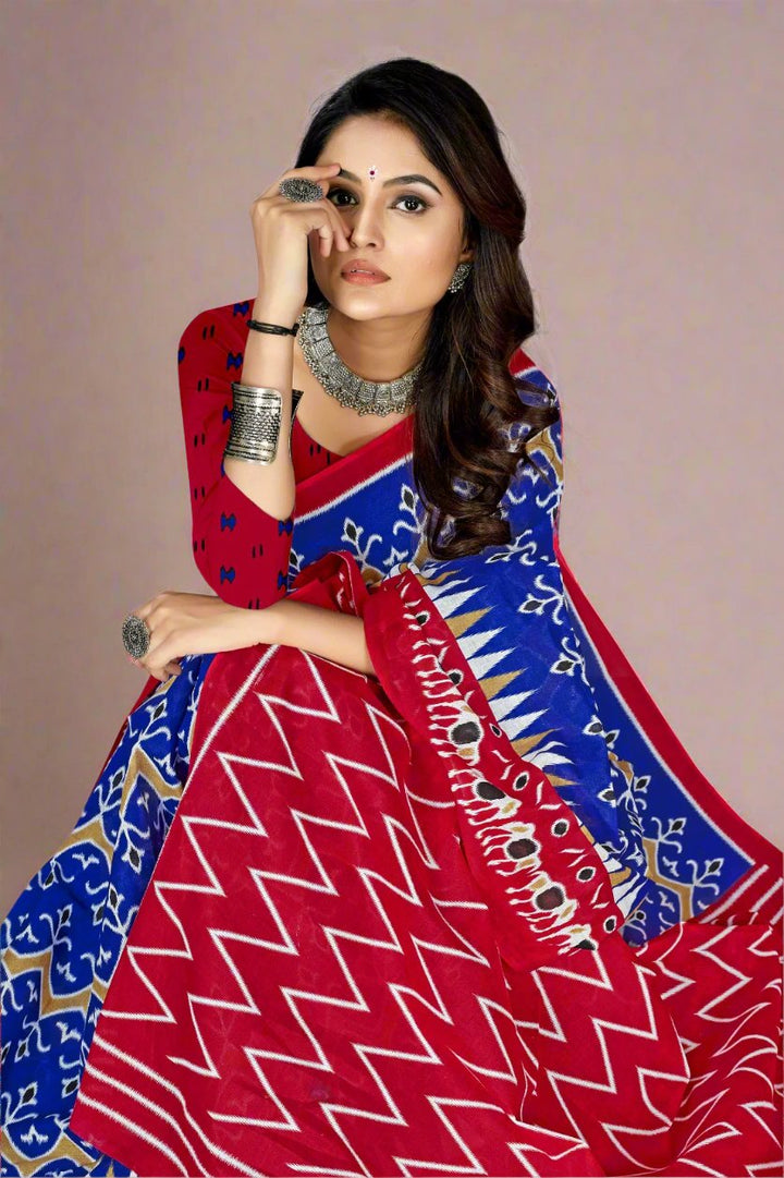 Beautiful blue and burgundy batik cotton saree, ideal for cultural gatherings and festive wear.