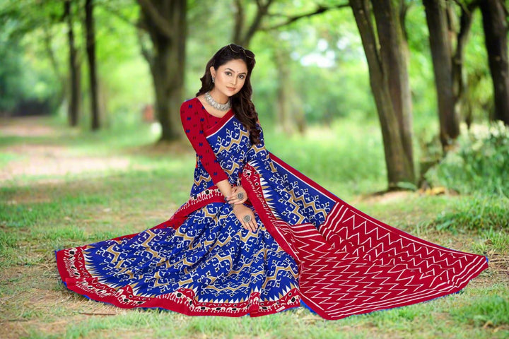 Stylish blue and burgundy batik print saree, perfect for traditional Indian wear at special occasions.