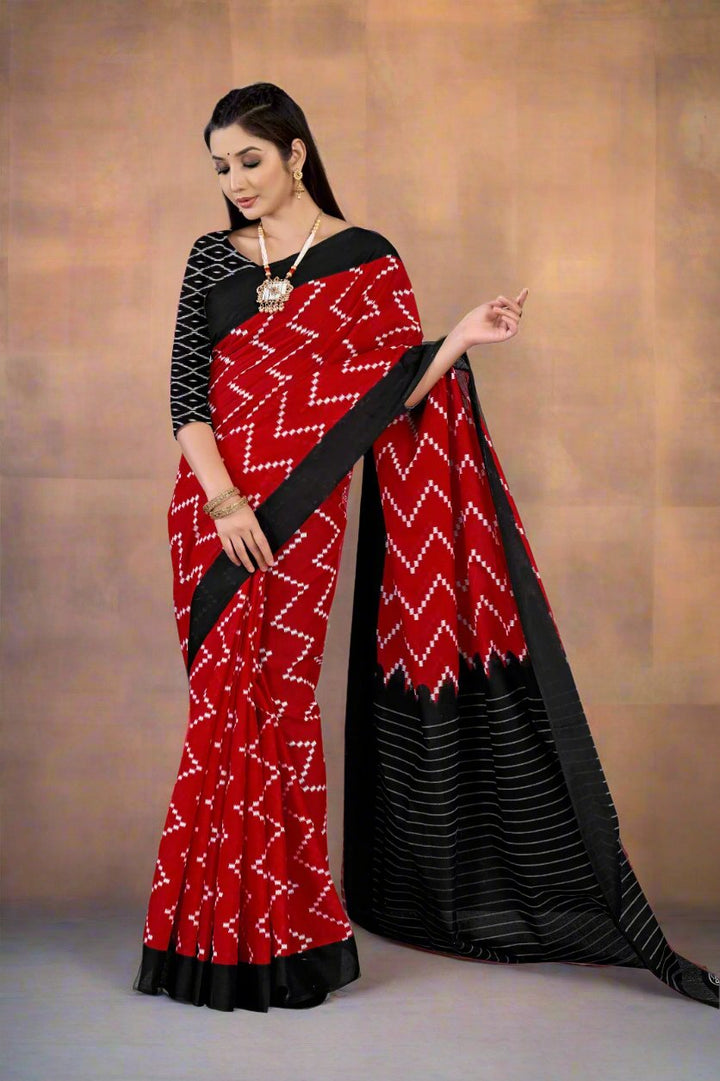 Beautiful Batik cotton saree in red and black, perfect for Indian cultural events.