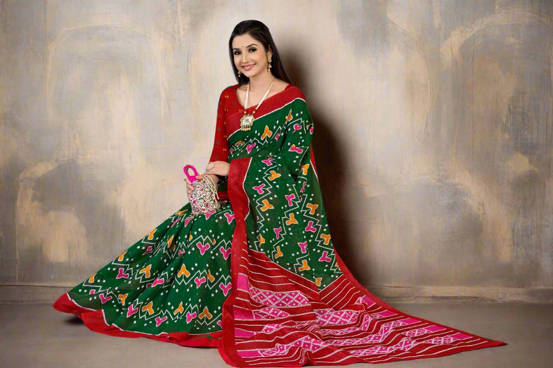 Beautiful green and red batik saree, perfect for cultural and festive weddings.