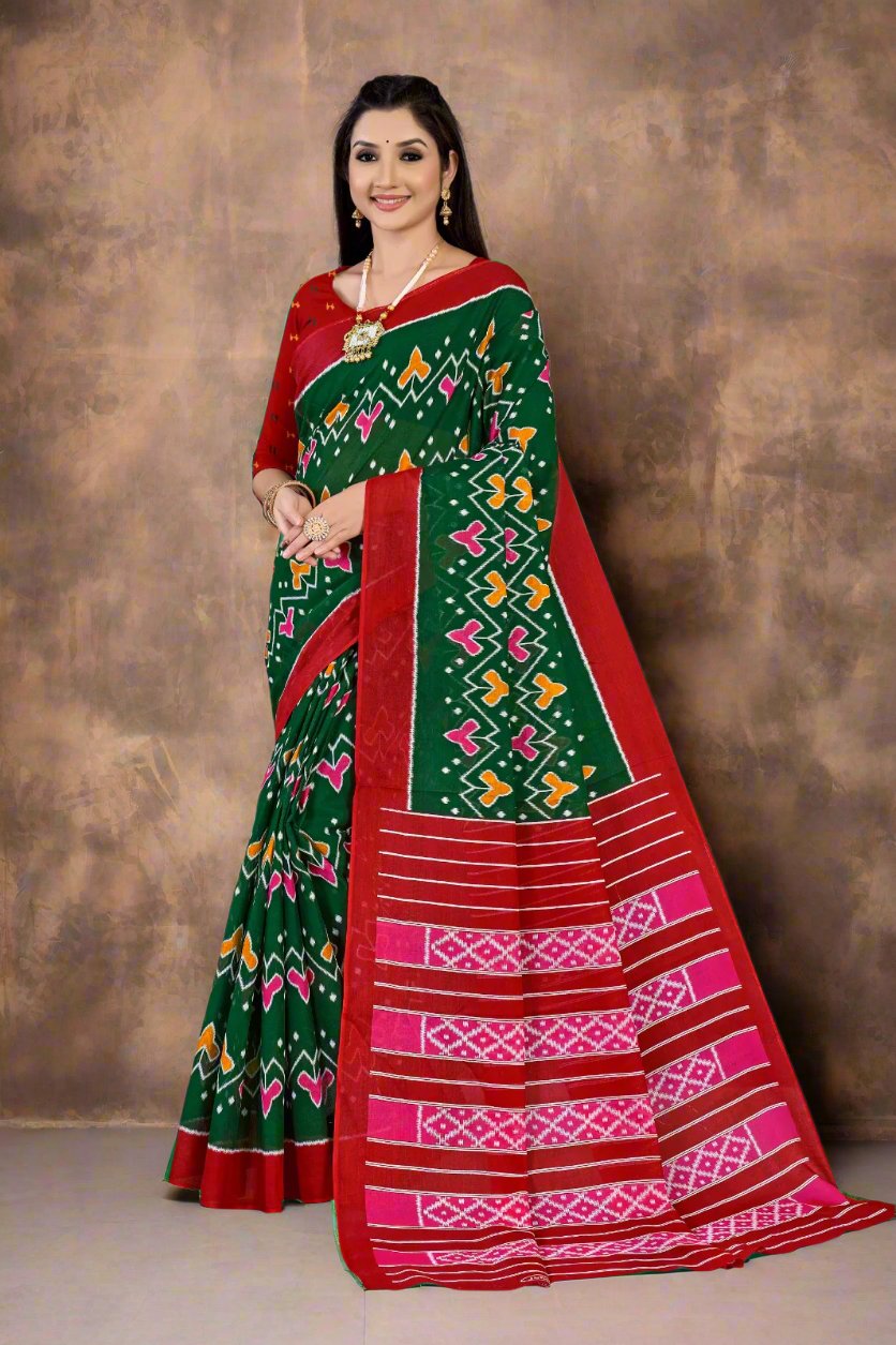 Fancy green and red batik print cotton saree, perfect for weddings and grand events.