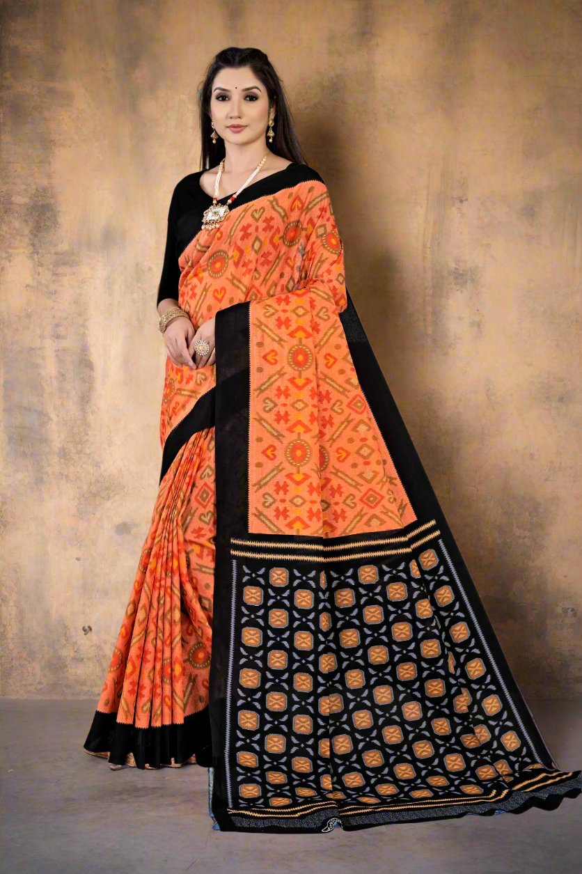 Unique orange and black batik print cotton saree, perfect for traditional Indian celebrations and cultural events.