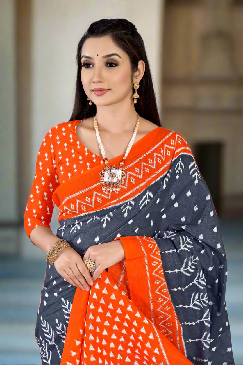 Sophisticated gray batik saree, ideal for elegant Indian celebrations.