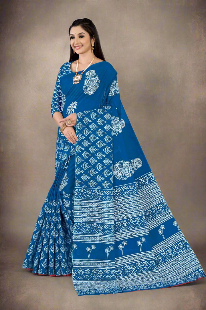 Electric blue batik cotton saree, showcasing unique Indian craftsmanship for festive celebrations.