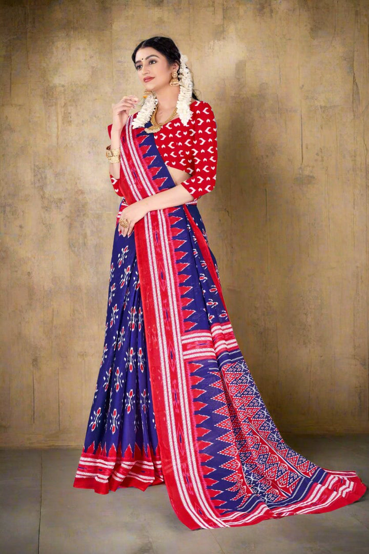 Beautiful navy blue and red batik print saree, perfect for Indian festive celebrations.