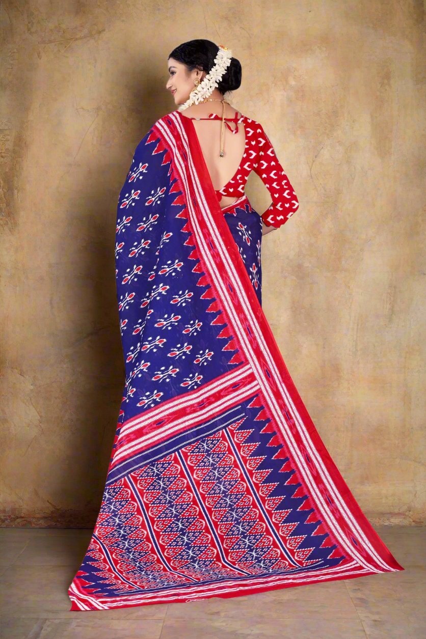 Elegant navy blue and red batik saree, ideal for designer saree lovers and festive events.