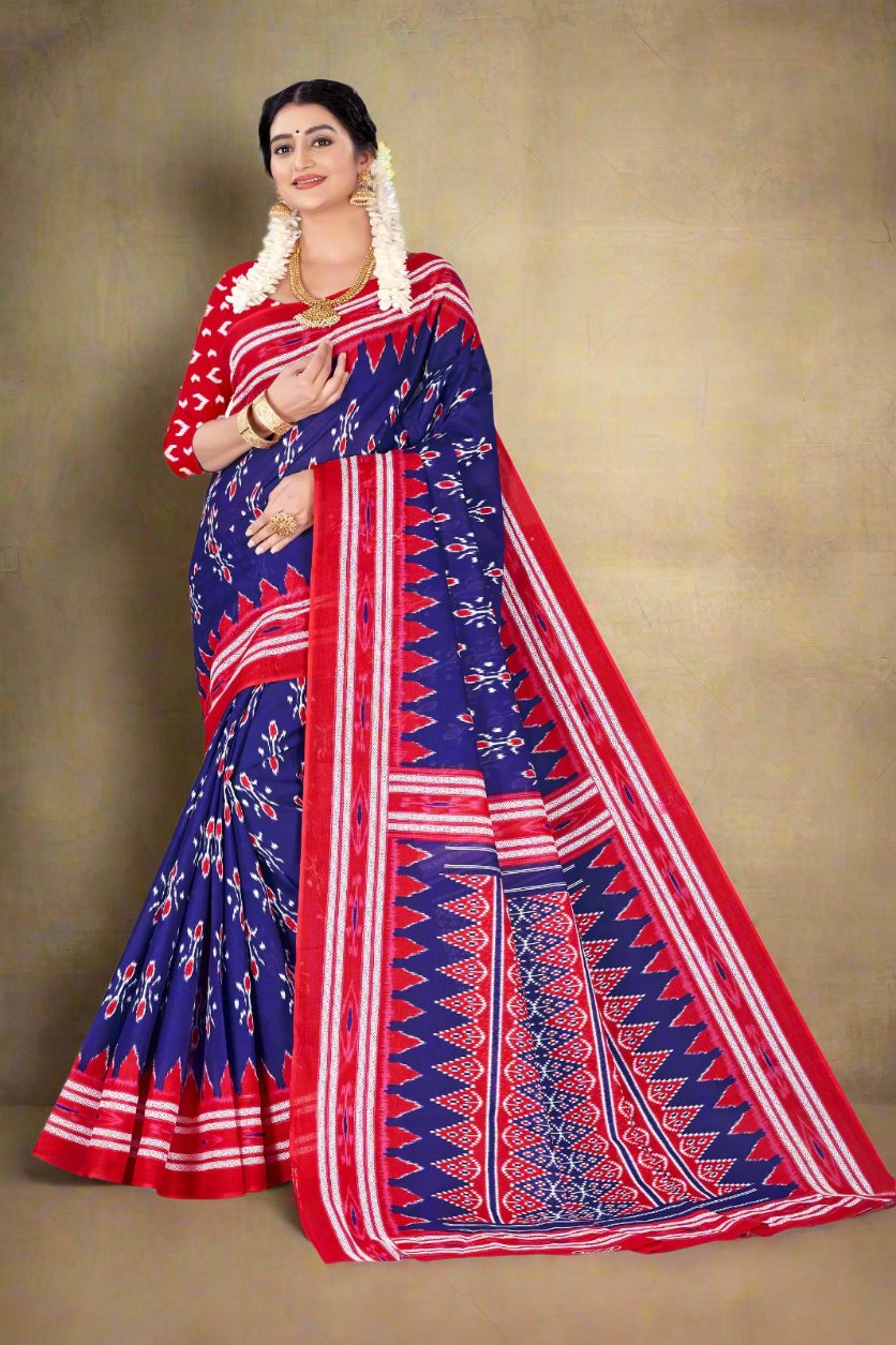 Navy blue and red batik cotton saree with festive designs, perfect for Indian wedding celebrations.